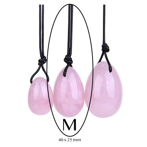 Yoni-Eier aus Rosenquarz mit Löchern