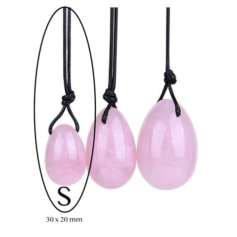 Yoni-Eier aus Rosenquarz mit Löchern