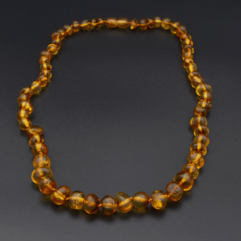Bernsteinkette aus polierten Perlen - Cognac