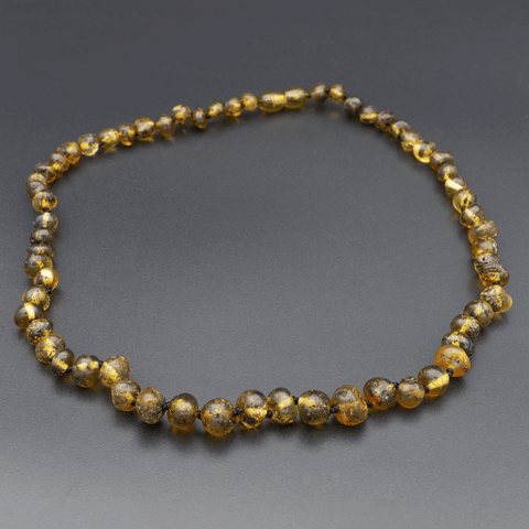 Collier Ambre Perles Polies – Vert, Authenticité et Bienfaits Naturels