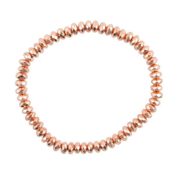 Bracelet extensible en hématite recouvert de cuivre facetté - Gemio.ch