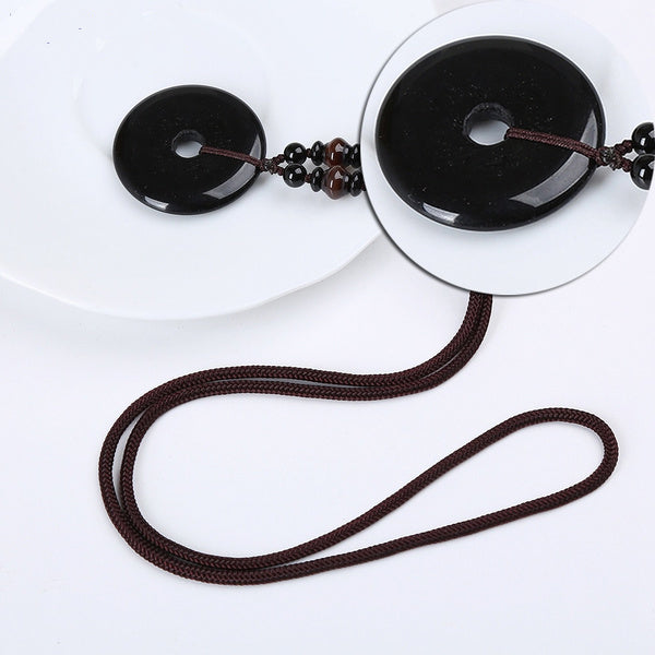 Pendentif Yumten avec pierre ronde en agate noire - Gemio.ch