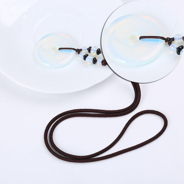 Pendentif Yumten avec pierre ronde en opale blanche - Gemio.ch